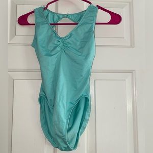 Mint ballet leotard with high leg cuts. Gently used
